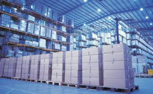 Storage facility with boxes stacks on pallets